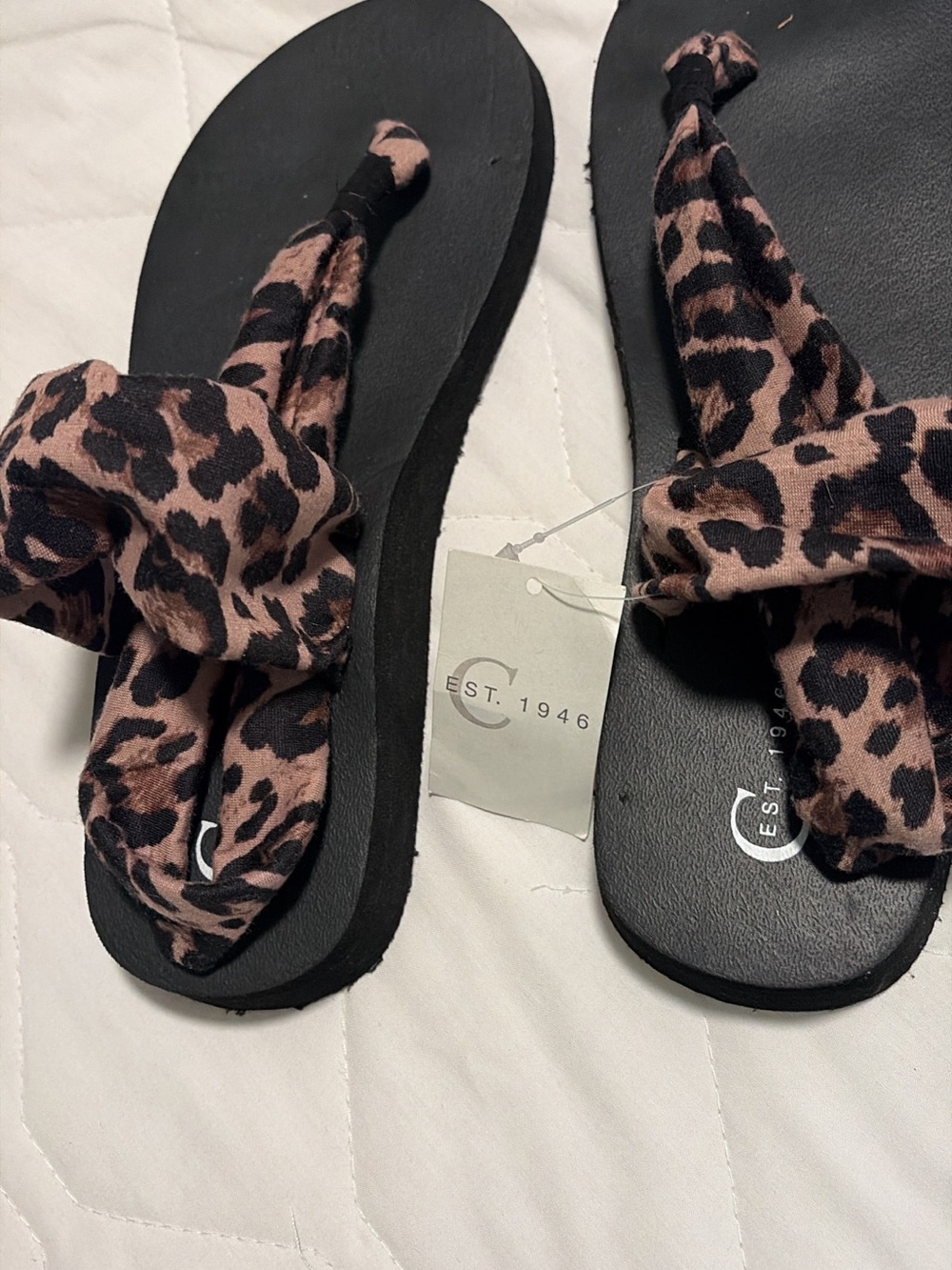 Leopard-Print Knotted Flip Flop Sandals in Pink and Black